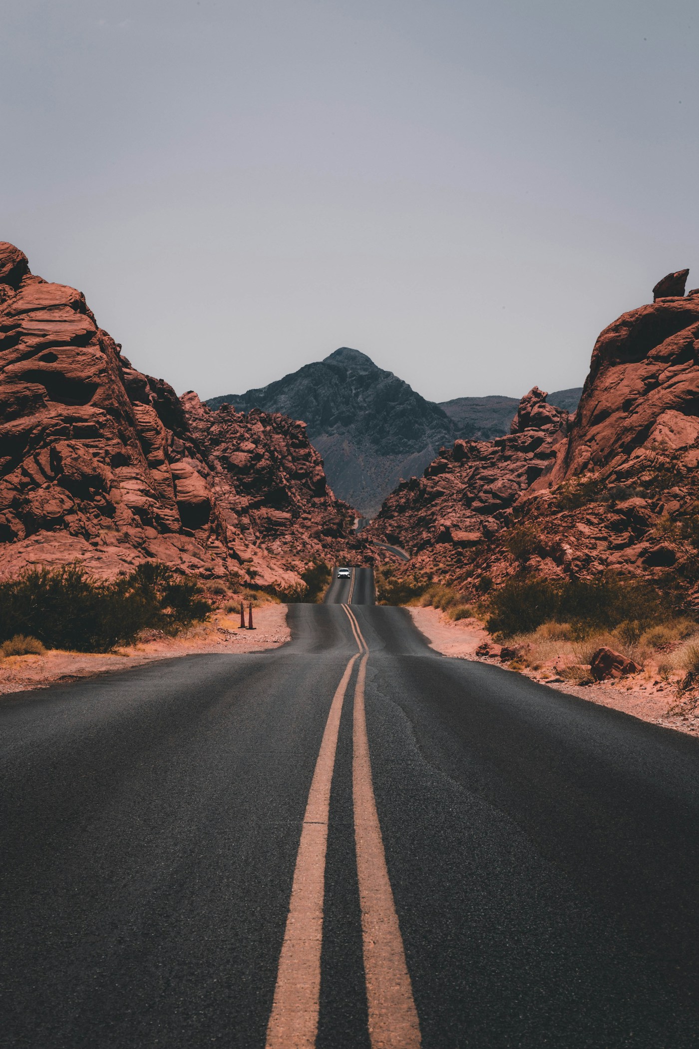 An open road through a wide landscape, a personal path with room to choose